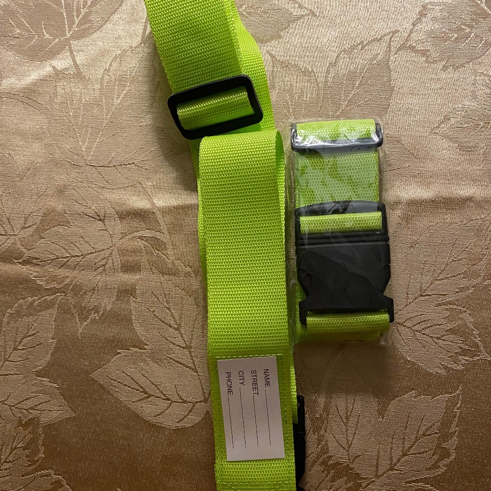 2 New Travel suitcase straps. Adjustable Heavy duty clips. Measures 2”X72”